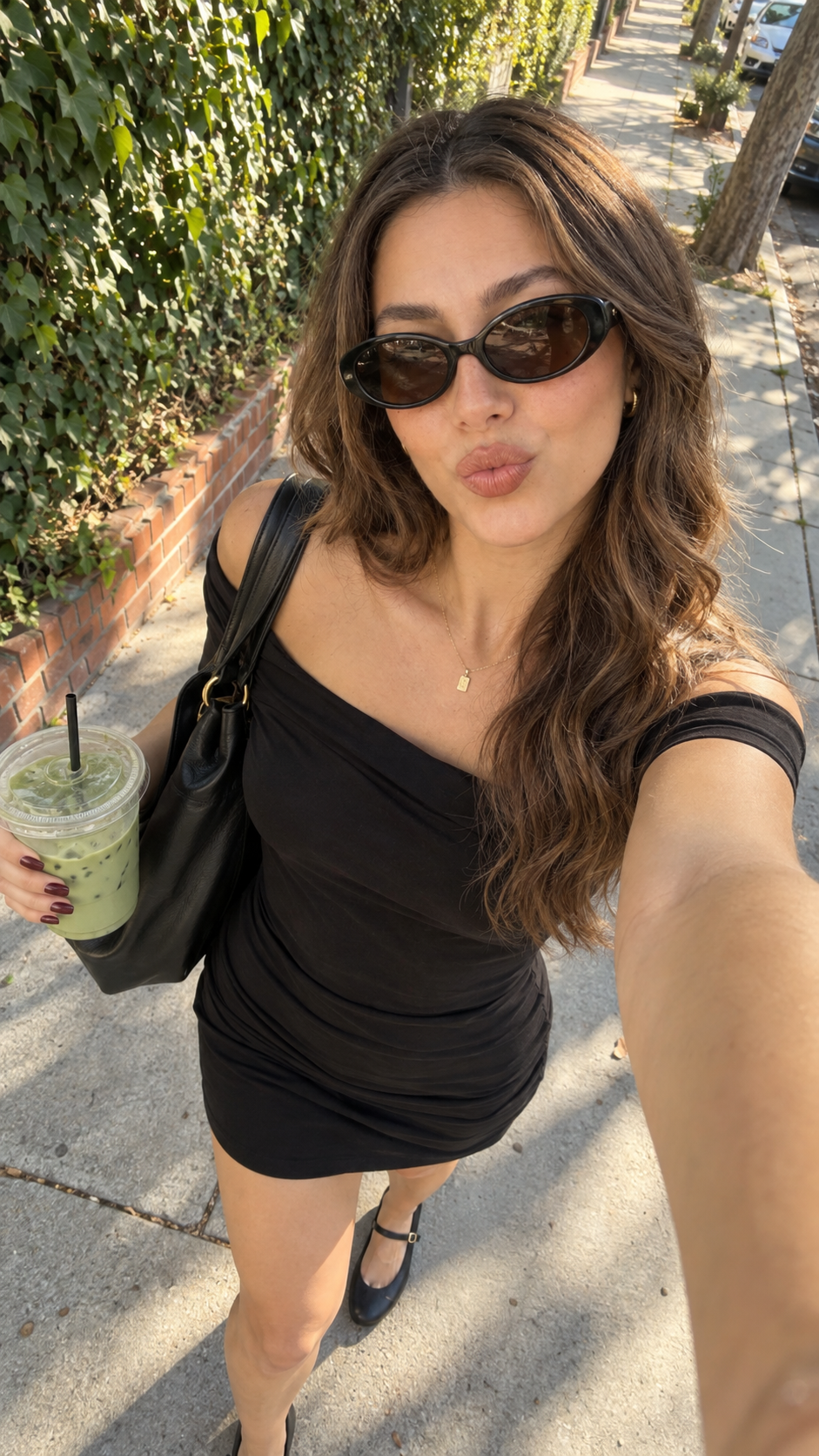Candid Y2K Street-Style Smartphone Selfie With Iced Matcha